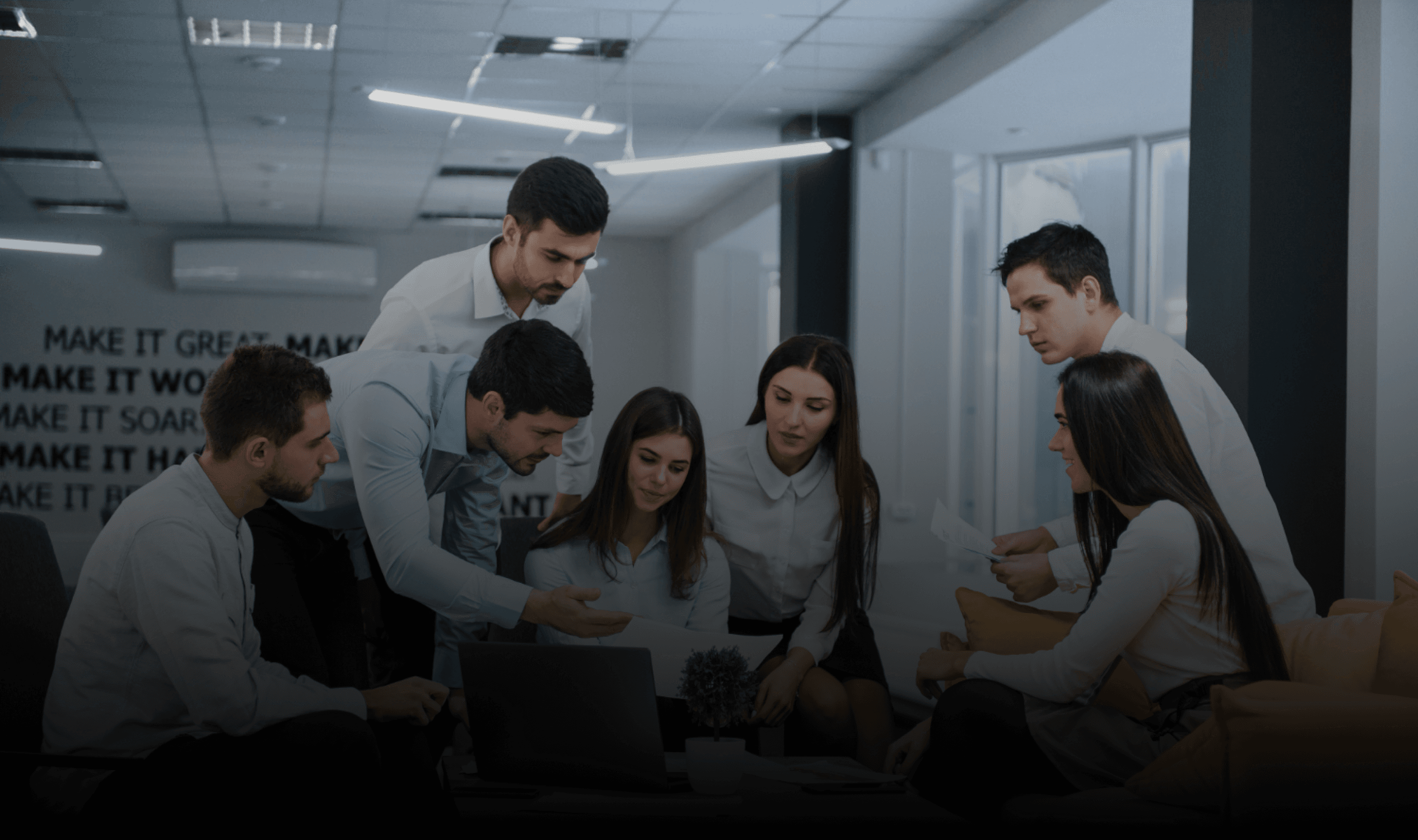 Hands holding holographic city buildings